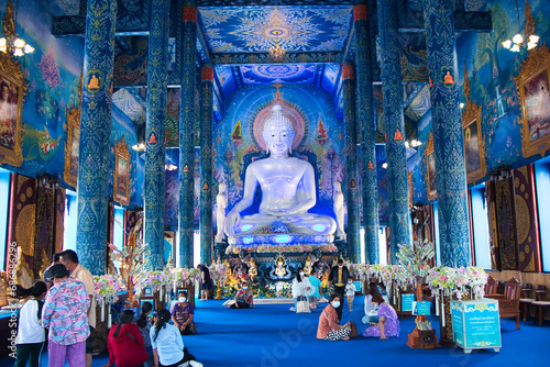 Buddha image in Wat Rong Suea Ten also known as the Blue Temple, Chiang Rai, Thailand photo