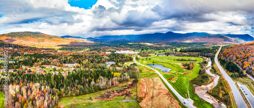 Aerial panorama of Presidential Range covered in clouds, in Bretton Woods, White Mountain National Forest, New Hampshire, along highway 302. photo
