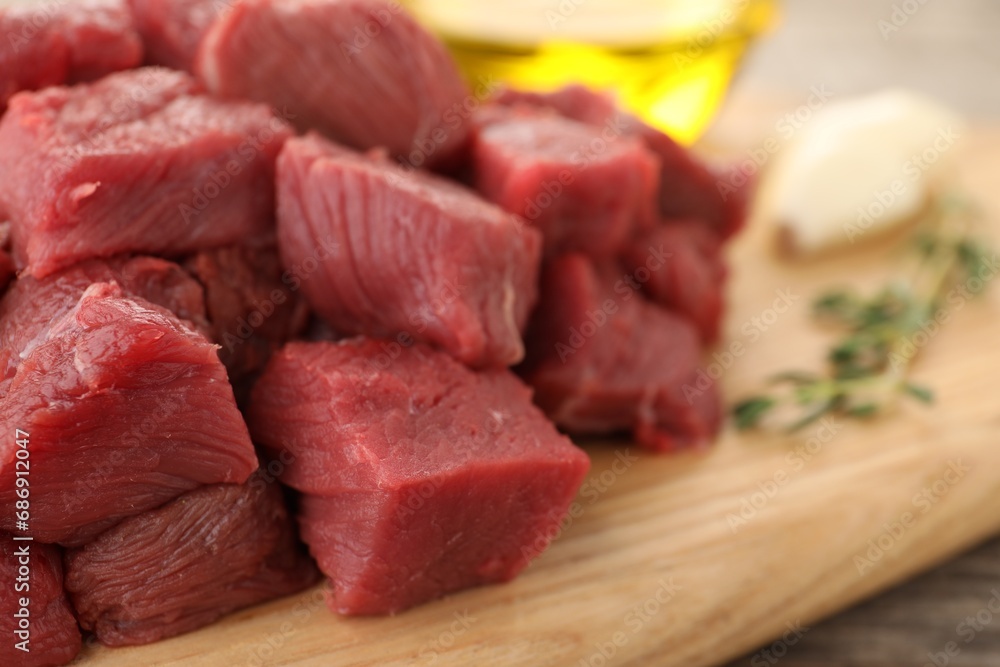 Pieces of raw beef meat on table, closeup. Space for text Pieces of raw beef meat on table, closeup. Space for text