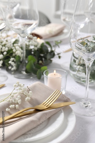 Beautiful table setting with floral decor, closeup