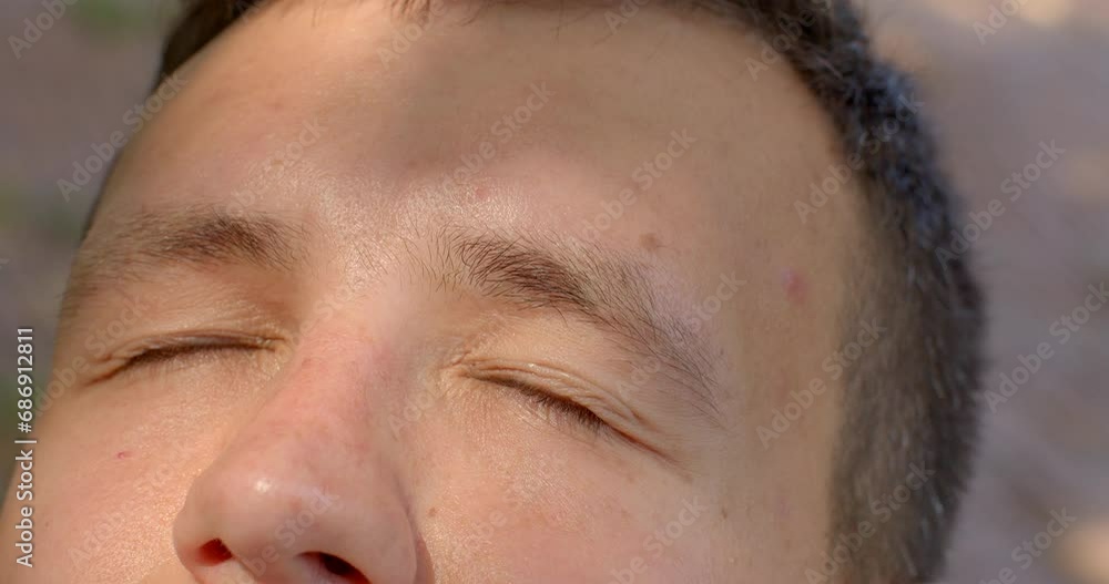 Close-up portrait young man playfully wiggles his eyebrows like clown, moves flexes his scalp. Performance non-verbal communication gesture. Facial Expressions playfulness Unusual talent performance. Close-up portrait young man playfully wiggles his eyebrows like clown, moves flexes his scalp. Performance non-verbal communication gesture. Facial Expressions playfulness Unusual talent performance.