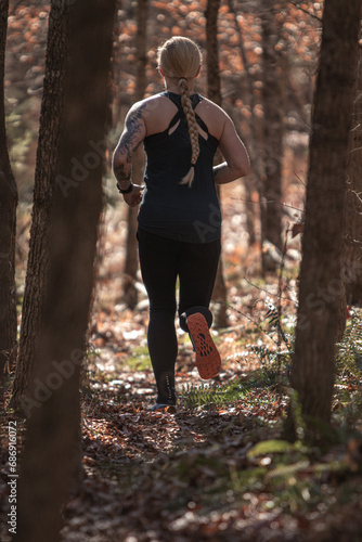 Woman running in the forrest