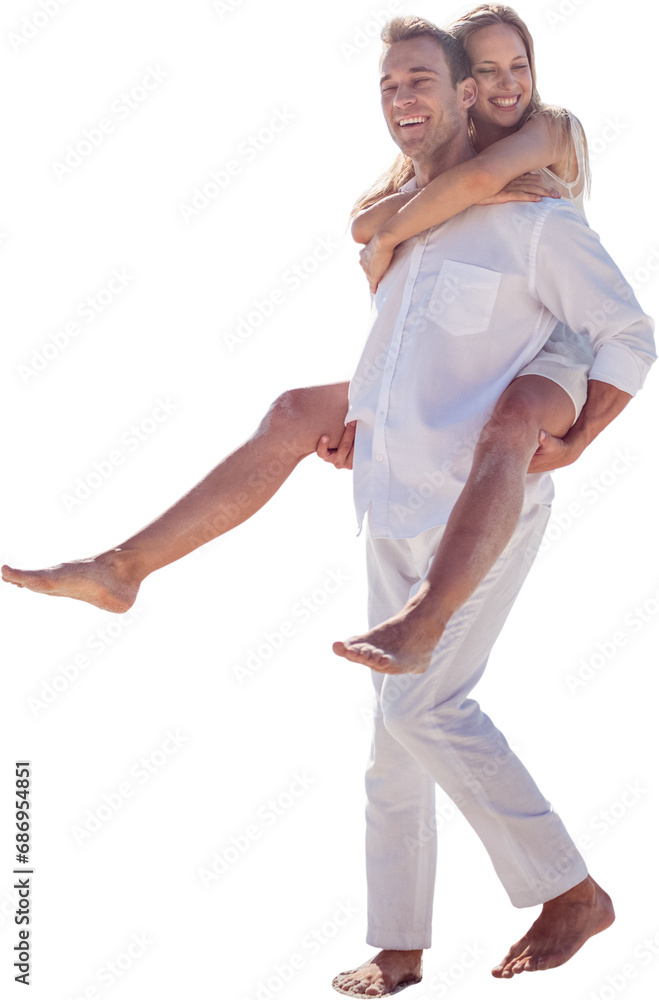 Digital png photo of happy caucasian man holding woman on back on transparent background Digital png photo of happy caucasian man holding woman on back on transparent background