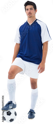 Digital png photo of latino male footballer with ball on transparent background