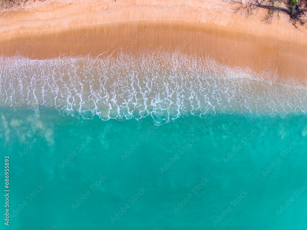 Fototapeta premium Beautiful waves sea surface in sunny day summer background, Amazing seascape, Top view beach sea background