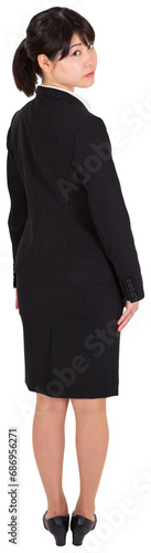 Digital png photo of back of asian businesswoman standing on transparent background