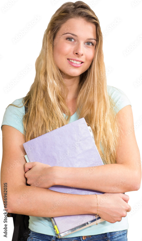 Digital png photo of happy caucasian woman holding notebooks on transparent background Digital png photo of happy caucasian woman holding notebooks on transparent background