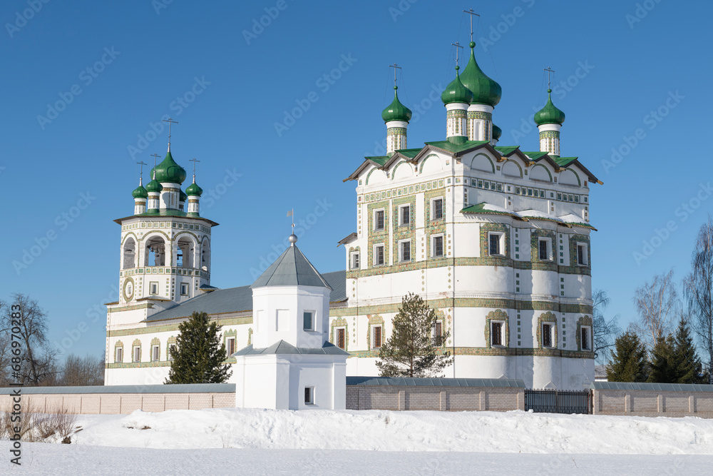 Church of St. John the Evangelist with a refectory and bell tower (1698) in the Nikolo-Vyazhishchi Monastery on a sunny March day. Vyazhishchi. Novgorod region, Russia