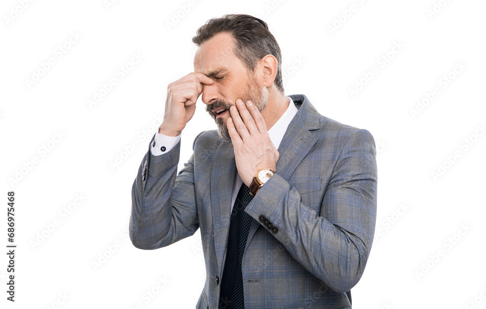 Businessman has toothache. Mature businessman in suit isolated on white. Headache and eye strain. Chronic headache. Migraine from overwork, deadline. Business man in suit with headache Businessman has toothache. Mature businessman in suit isolated on white. Headache and eye strain. Chronic headache. Migraine from overwork, deadline. Business man in suit with headache