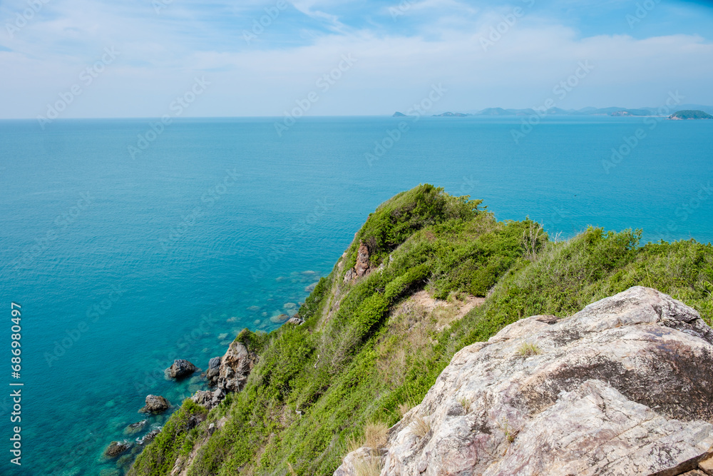 Viewpoint over Ko Kham Island Sattahip Chonburi Samaesan Thailand a tropical island with turqouse colored ocen, you can reach the viewpoint after a short hike in the jungle forest