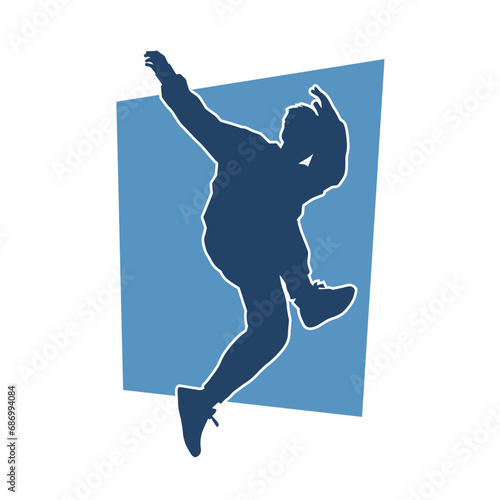 Silhouette of a sporty man jumping. Silhouette of a dancer male in action pose.