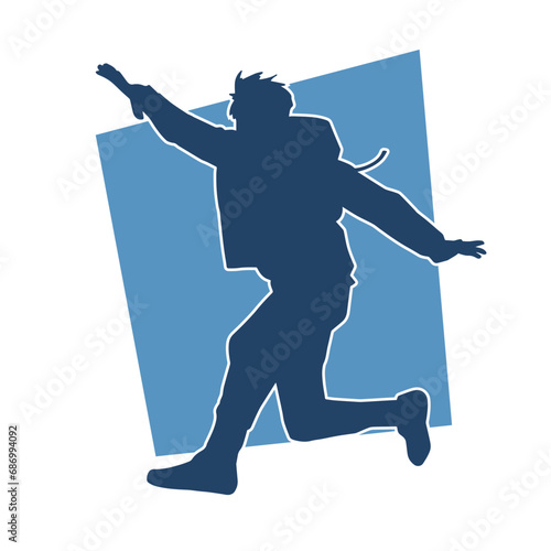 Silhouette of a sporty man jumping. Silhouette of a dancer male in action pose.