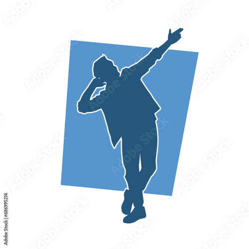 Silhouette of a man in dancing pose. Silhouette of a male dancer in performing pose.
