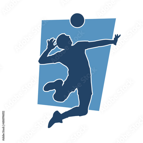 Silhouette of a male volley athlete in action pose. Silhouette of a man playing volley ball sport.