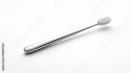 a modern, sleek silver toothbrush against a pure white backdrop, emphasizing its elegant design.