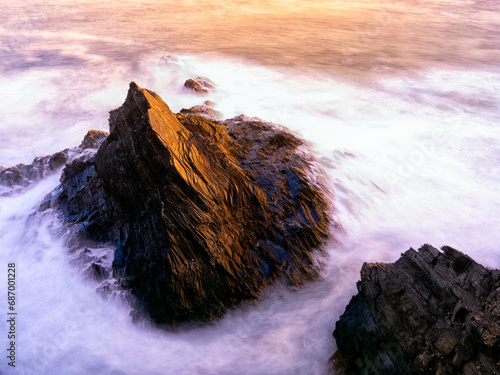 Rock ledges plunging onto the sea at Zambujeira do Mar photo