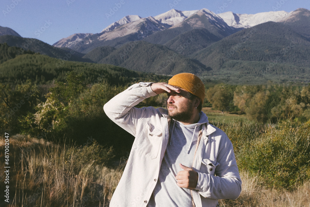 joyful male tourist in autumn.