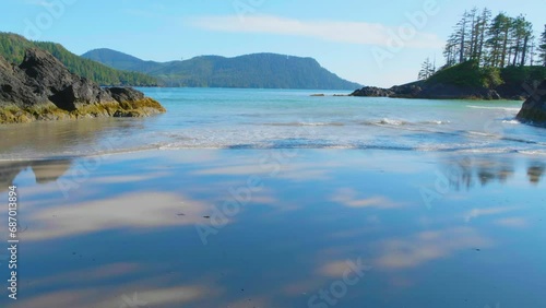 Beautiful panoramic view of sandy beach on Pacific Ocean Coast. Taken in San Josef Bay, Cape Scott Provincial Park, Northern Vancouver Island, BC, Canada.  photo