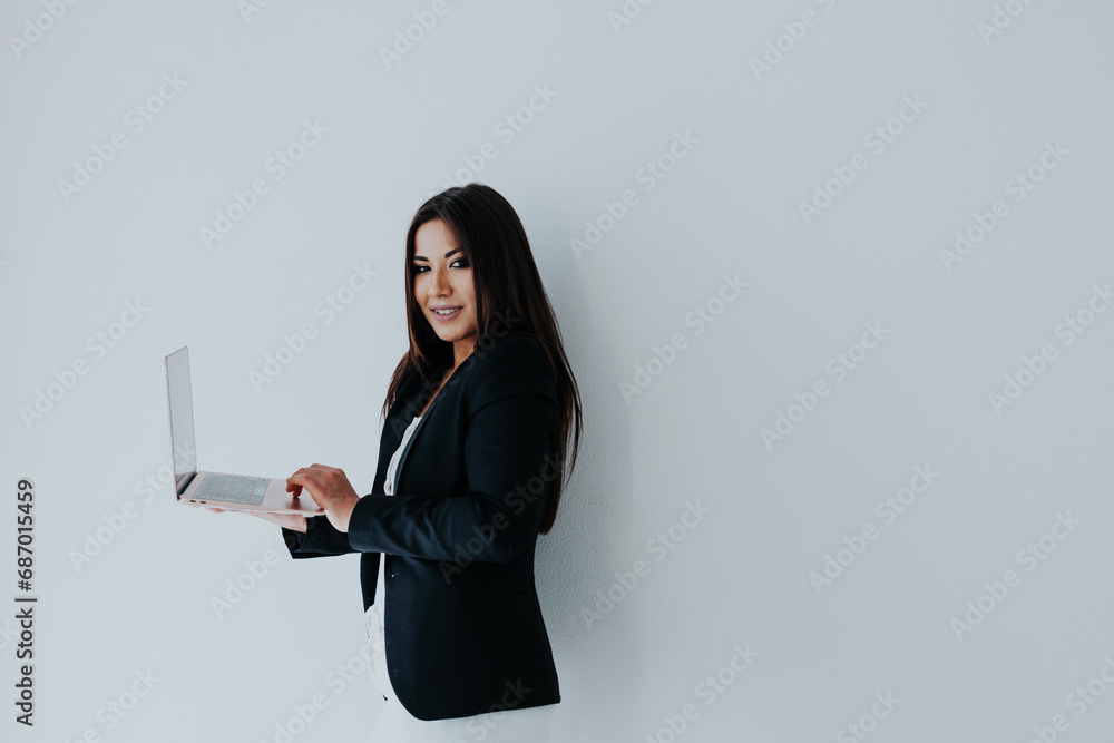 Beautiful business woman brunette at work in office Beautiful business woman brunette at work in office