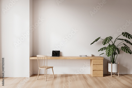Fototapeta Naklejka Na Ścianę i Meble -  White home office interior with laptop