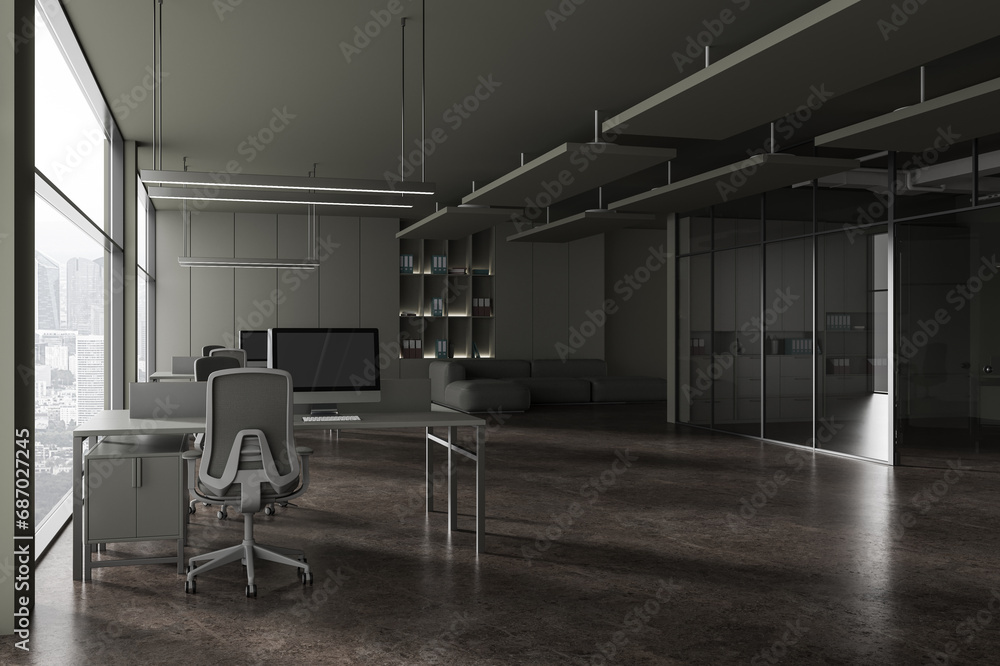 Gray open space office interior with sofa