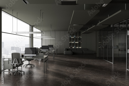 Grey office interior with workplace and relax zone, panoramic window