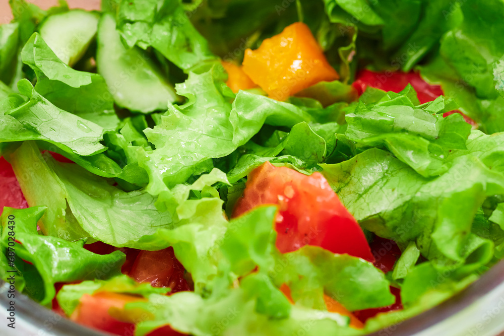 Vegetable salad with tomatoes, cucumbers and herbs. Vegetable salad with tomatoes, cucumbers and herbs.