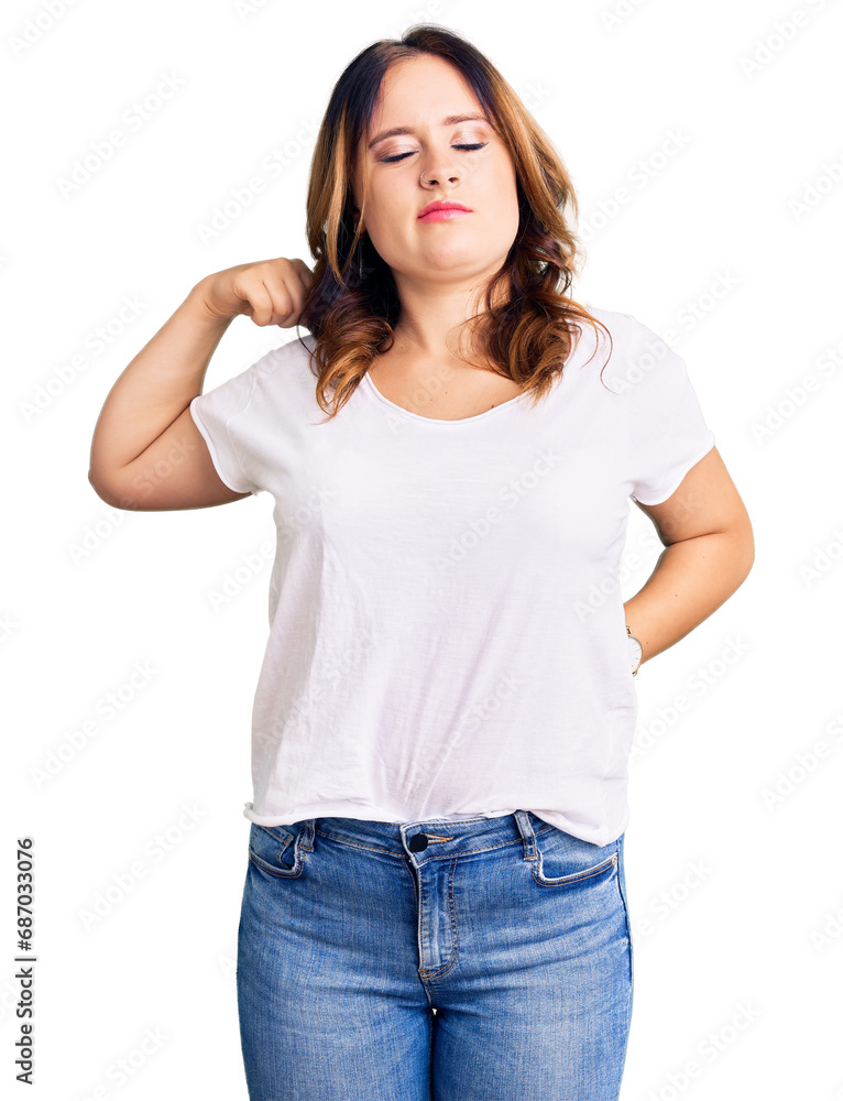 Obraz premium Young beautiful caucasian woman wearing casual white tshirt suffering of neck ache injury, touching neck with hand, muscular pain