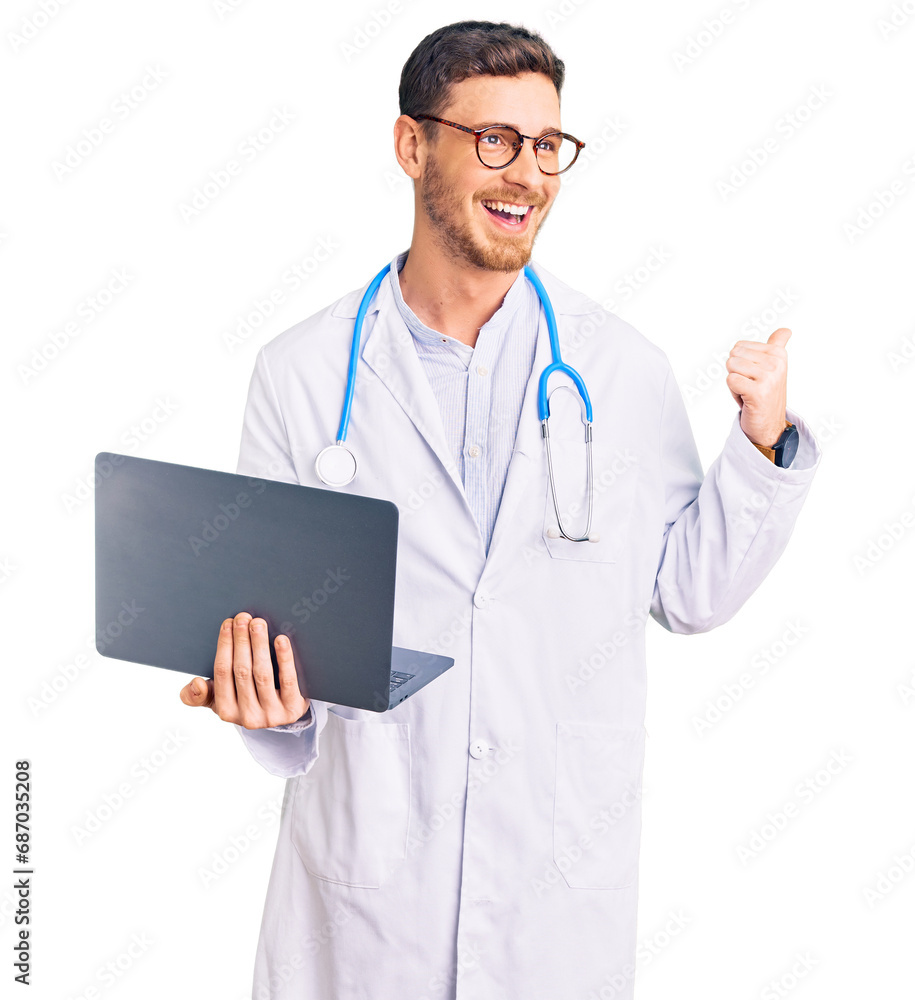 Handsome young man with bear wearing doctor uniform working using computer laptop pointing thumb up to the side smiling happy with open mouth Handsome young man with bear wearing doctor uniform working using computer laptop pointing thumb up to the side smiling happy with open mouth