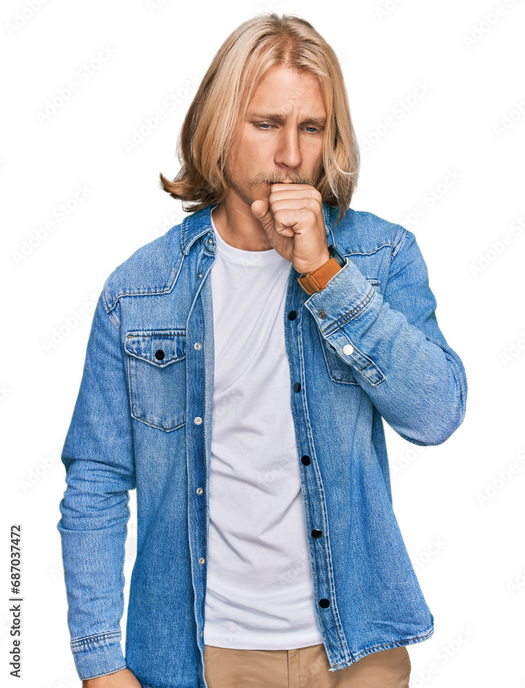 Caucasian man with blond long hair wearing casual denim jacket feeling unwell and coughing as symptom for cold or bronchitis. health care concept. Caucasian man with blond long hair wearing casual denim jacket feeling unwell and coughing as symptom for cold or bronchitis. health care concept.