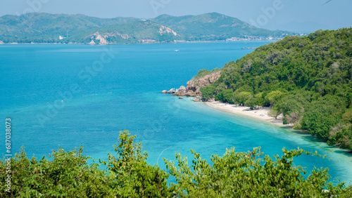 Viewpoint over Ko Kham Island Sattahip Chonburi Samaesan Thailand a tropical island with turqouse colored ocen, you can reach the viewpoint after a short hike in the jungle