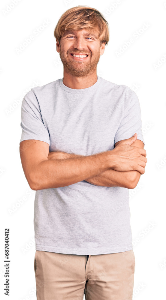 Handsome caucasian man with beard wearing casual tshirt happy face smiling with crossed arms looking at the camera. positive person. Handsome caucasian man with beard wearing casual tshirt happy face smiling with crossed arms looking at the camera. positive person.