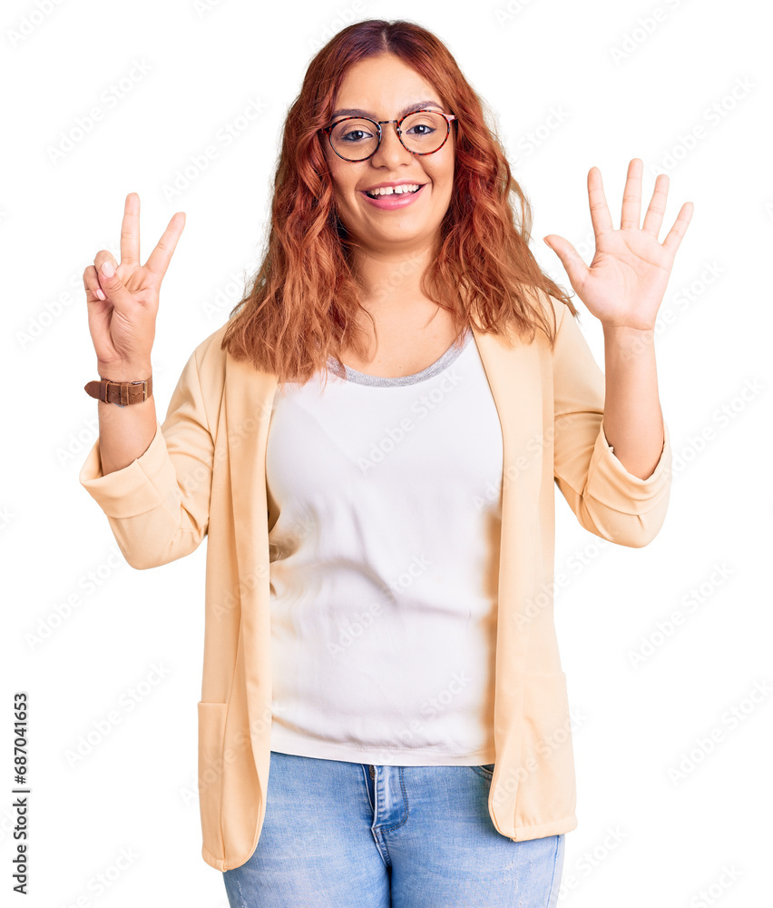 Young latin woman wearing business clothes showing and pointing up with fingers number seven while smiling confident and happy. Young latin woman wearing business clothes showing and pointing up with fingers number seven while smiling confident and happy.