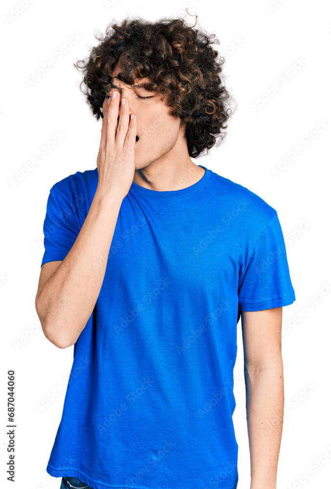 Caucasian teenager wearing casual clothes bored yawning tired covering mouth with hand. restless and sleepiness. Caucasian teenager wearing casual clothes bored yawning tired covering mouth with hand. restless and sleepiness.