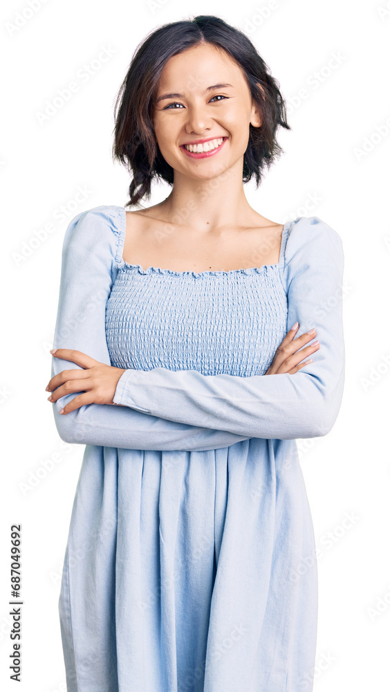 Young beautiful girl wearing casual clothes happy face smiling with crossed arms looking at the camera. positive person. Young beautiful girl wearing casual clothes happy face smiling with crossed arms looking at the camera. positive person.