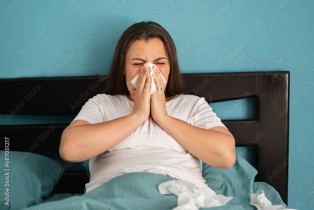 Cold and flue concept. Sick woman suffering from running stuffy nose