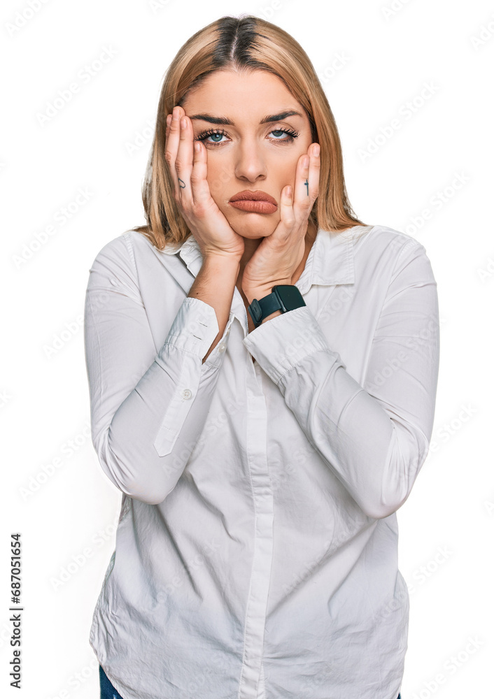 Young caucasian woman wearing casual clothes tired hands covering face, depression and sadness, upset and irritated for problem Young caucasian woman wearing casual clothes tired hands covering face, depression and sadness, upset and irritated for problem