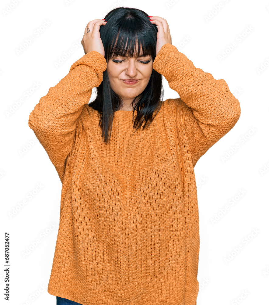 Young hispanic woman wearing casual clothes suffering from headache desperate and stressed because pain and migraine. hands on head. Young hispanic woman wearing casual clothes suffering from headache desperate and stressed because pain and migraine. hands on head.