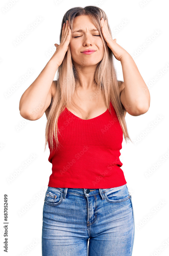 Young beautiful blonde woman wearing casual clothes suffering from headache desperate and stressed because pain and migraine. hands on head.