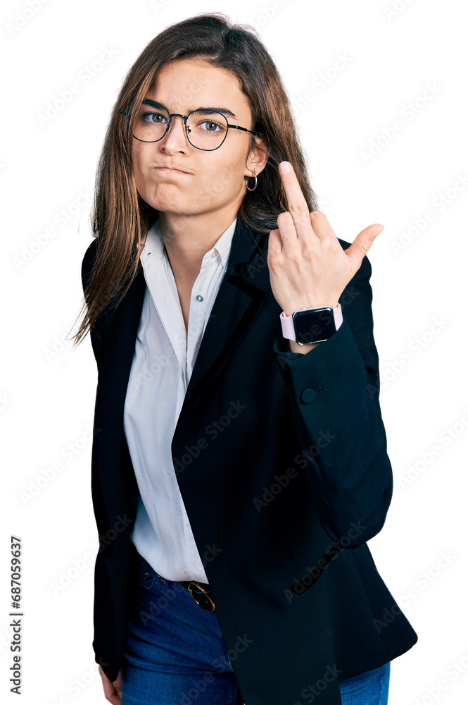 Young caucasian girl wearing business style and glasses showing middle finger, impolite and rude fuck off expression Young caucasian girl wearing business style and glasses showing middle finger, impolite and rude fuck off expression