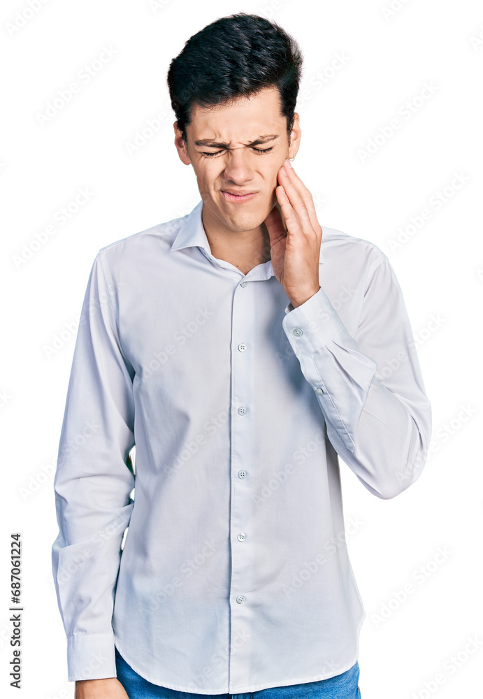 Young hispanic business man wearing business clothes touching mouth with hand with painful expression because of toothache or dental illness on teeth. dentist Young hispanic business man wearing business clothes touching mouth with hand with painful expression because of toothache or dental illness on teeth. dentist