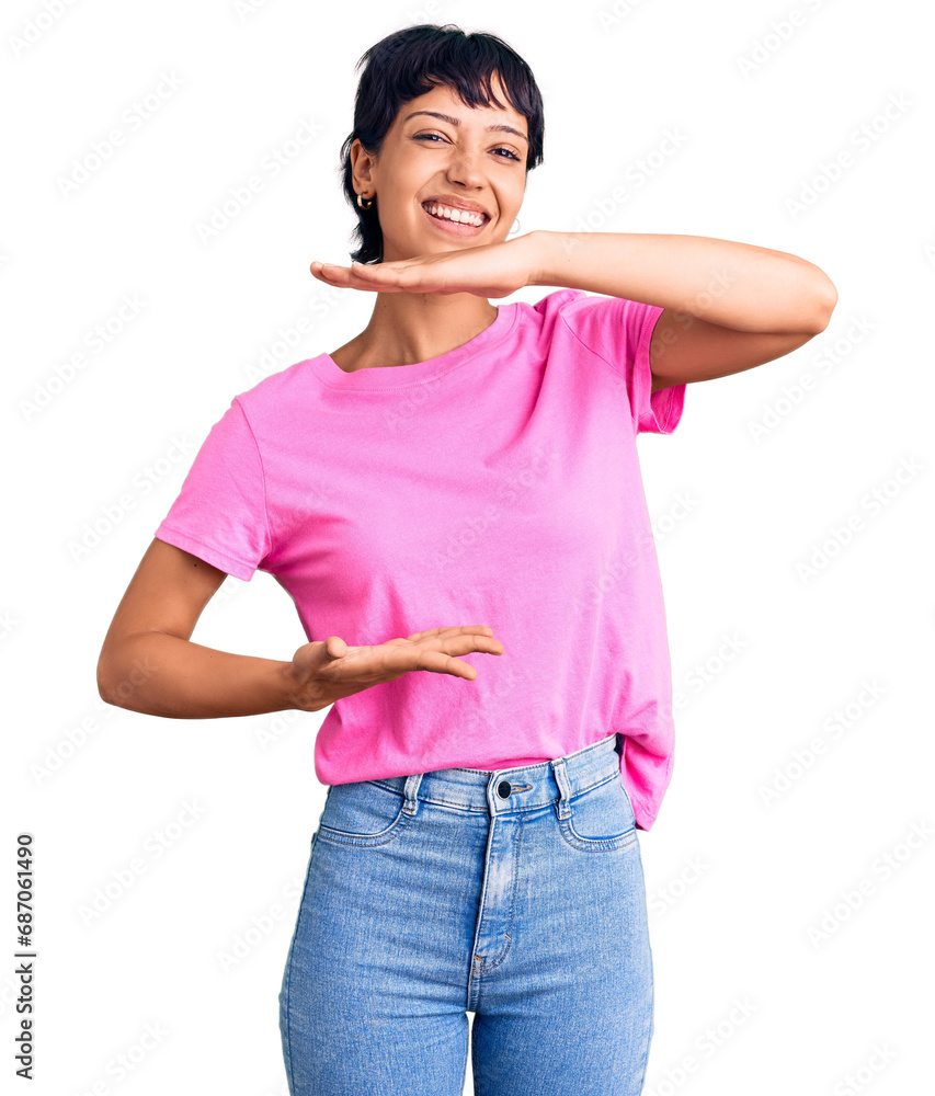 Young brunette woman with short hair wearing casual clothes gesturing with hands showing big and large size sign, measure symbol. smiling looking at the camera. measuring concept. Young brunette woman with short hair wearing casual clothes gesturing with hands showing big and large size sign, measure symbol. smiling looking at the camera. measuring concept.