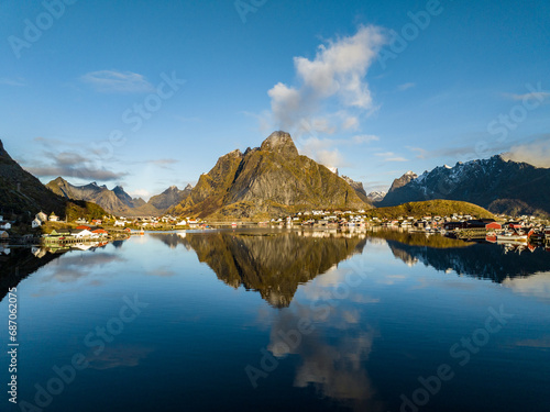 view of Rostad kirkefjorden mountain with clouds appear from the peak like from the volcano on lofoten island view from reine village