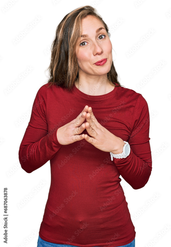 Φωτογραφία Young blonde woman wearing casual clothes hands together and fingers crossed smiling relaxed and cheerful