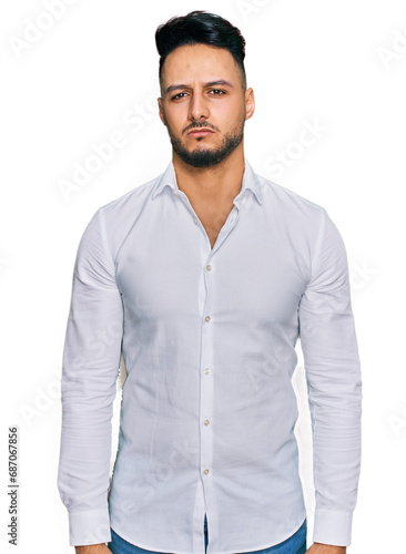 Young arab man wearing casual clothes depressed and worry for distress, crying angry and afraid. sad expression.