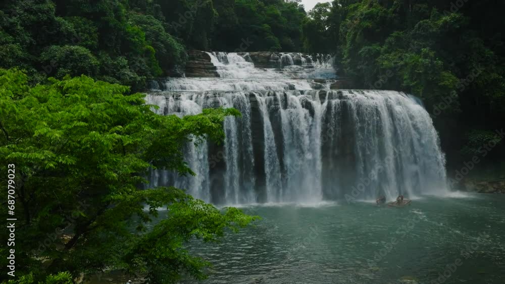 Water stream surrounded by forest. Tinuy-an Falls. Bislig. Surigao del Sur, Philippines. Water stream surrounded by forest. Tinuy-an Falls. Bislig. Surigao del Sur, Philippines.