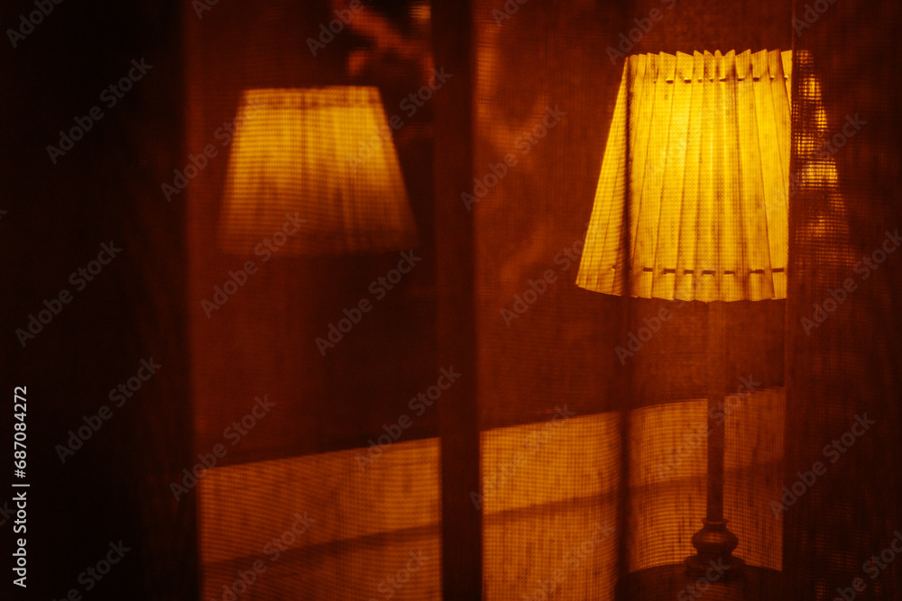 Bright Sunlight Illuminating Empty Home Interior Through Yellow Curtains. Bright yellow curtain decorates an illuminated empty room at night. Bright Sunlight Illuminating Empty Home Interior Through Yellow Curtains. Bright yellow curtain decorates an illuminated empty room at night.