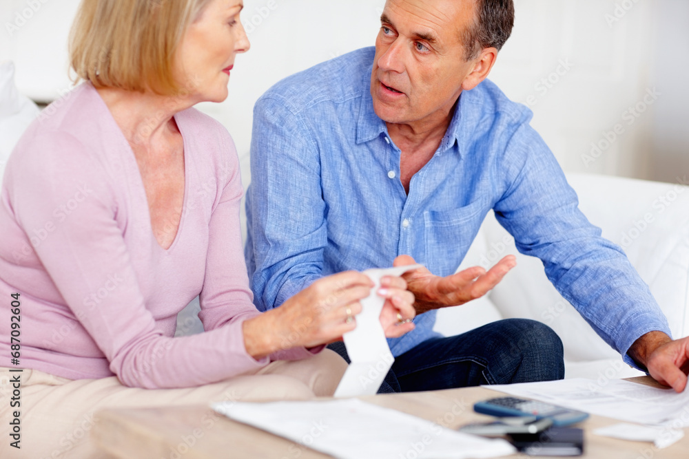 Receipt, debt or senior couple with computer in home for retirement savings or pension planning. Profit growth, financial investment or mature man talking to a woman for house bills, taxes or budget Receipt, debt or senior couple with computer in home for retirement savings or pension planning. Profit growth, financial investment or mature man talking to a woman for house bills, taxes or budget