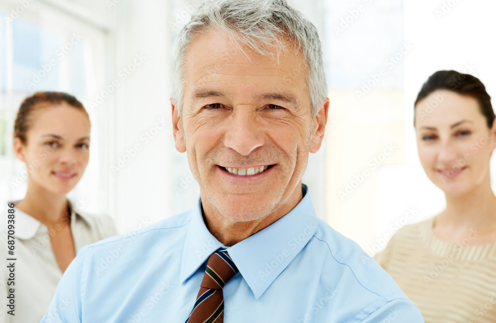Fototapeta premium Portrait, business and leadership with a senior man in the office as a CEO, manager or boss of a company. Face, smile and management with a happy mature leader in the workplace for a corporate job