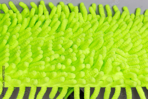 Green reusable chenille microfiber pad for mop, fragment close-up